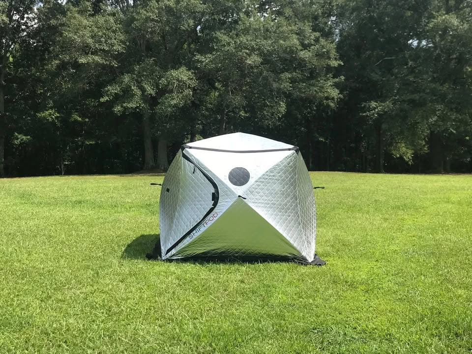A ShiftPod Mini set up with coolers in front